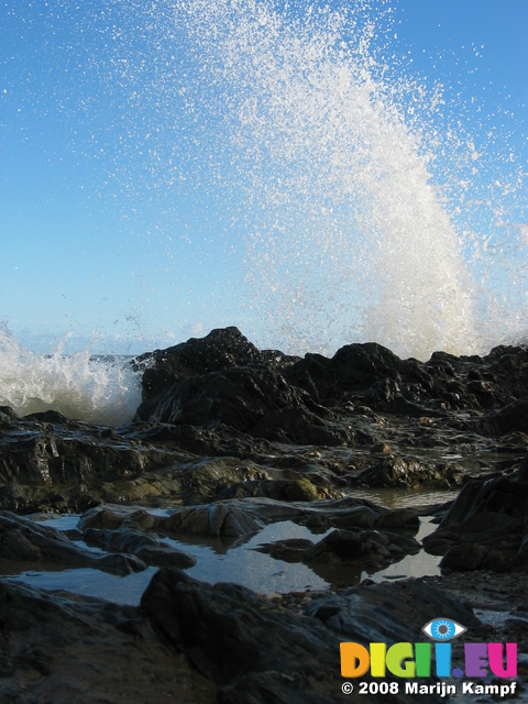 24245 Spray of waves splashing on rocks